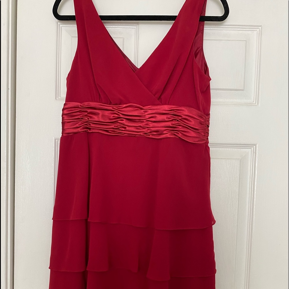 Red chiffon tiered midi dress with satin attached. belt.